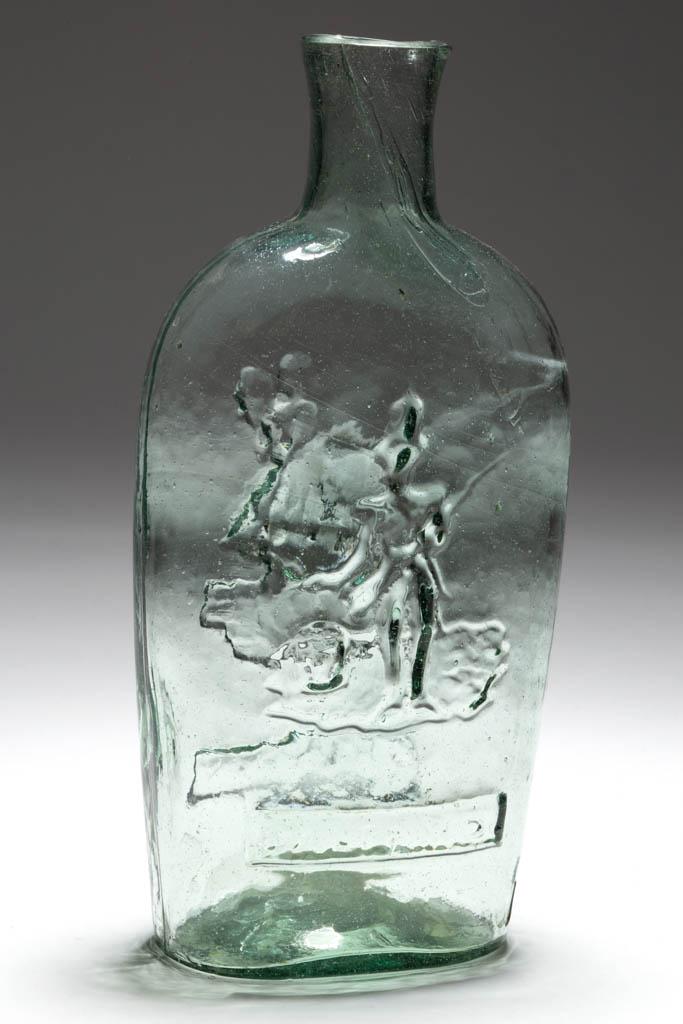 GXIII-11 SOLDIER - DANCER PICTORIAL FLASK: GXIII-11 SOLDIER - DANCER PICTORIAL FLASK, light green, pint, obverse embossed "BALT. MD." below soldier, reverse embossed "CHAPMAN." below dancer, plain mouth, light rough pontil mark. J. L. Chapman'