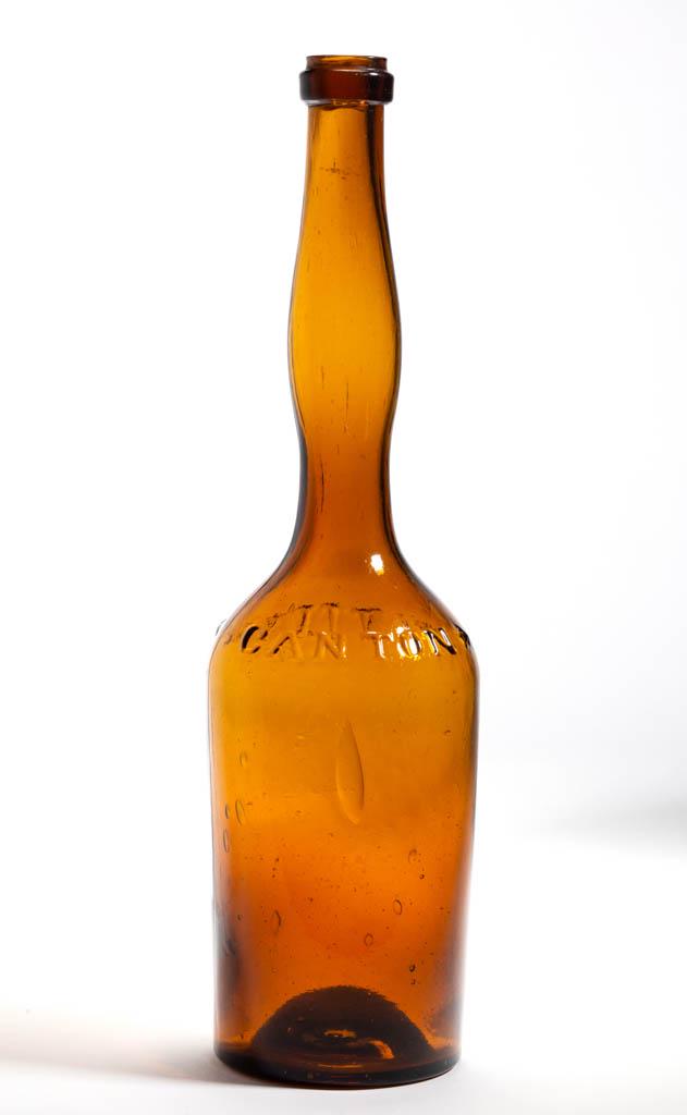 CANTON BITTERS BOTTLE: CANTON BITTERS BOTTLE, medium yellow amber, cylindrical form with lady's-leg neck, embossed "CANTON (five-point star) - BITTERS (five-point star)" around shoulder, applied flat collar below the plain 