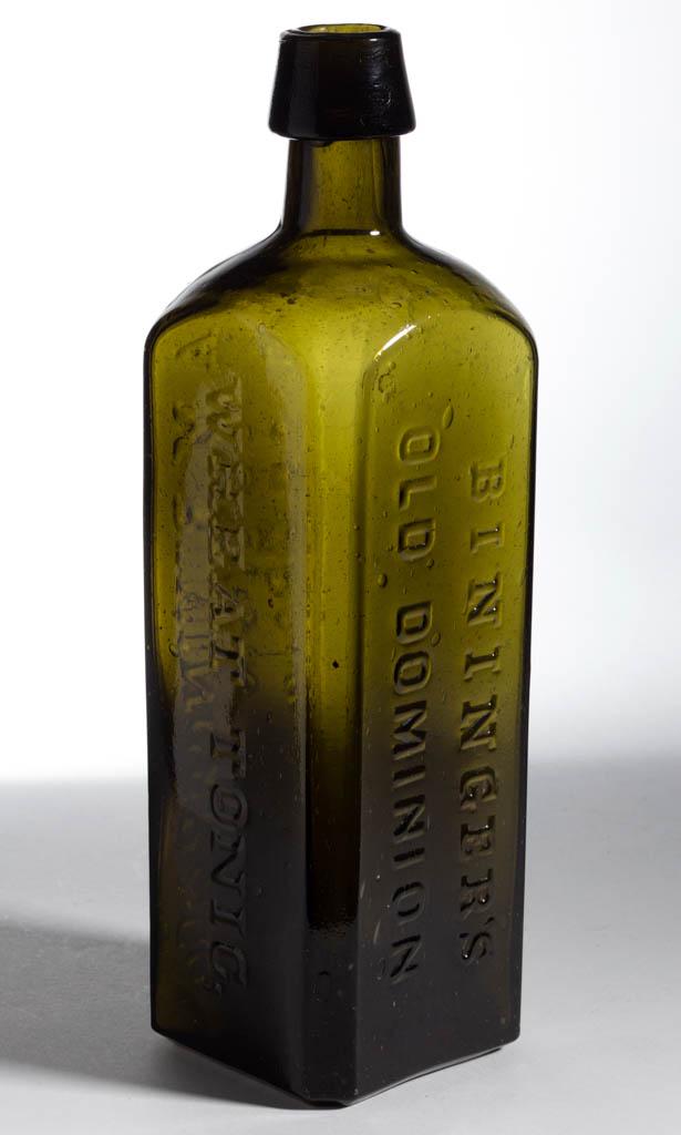 BININGER'S WHEAT TONIC WHISKEY BOTTLE: BININGER'S WHEAT TONIC WHISKEY BOTTLE, deep olive green, square form embossed on three sides, "BININGER'S / OLD DOMINION - WHEAT TONIC. - A. M. BININGER & CO: / No. 19 BROAD ST, N. Y.", applied broad