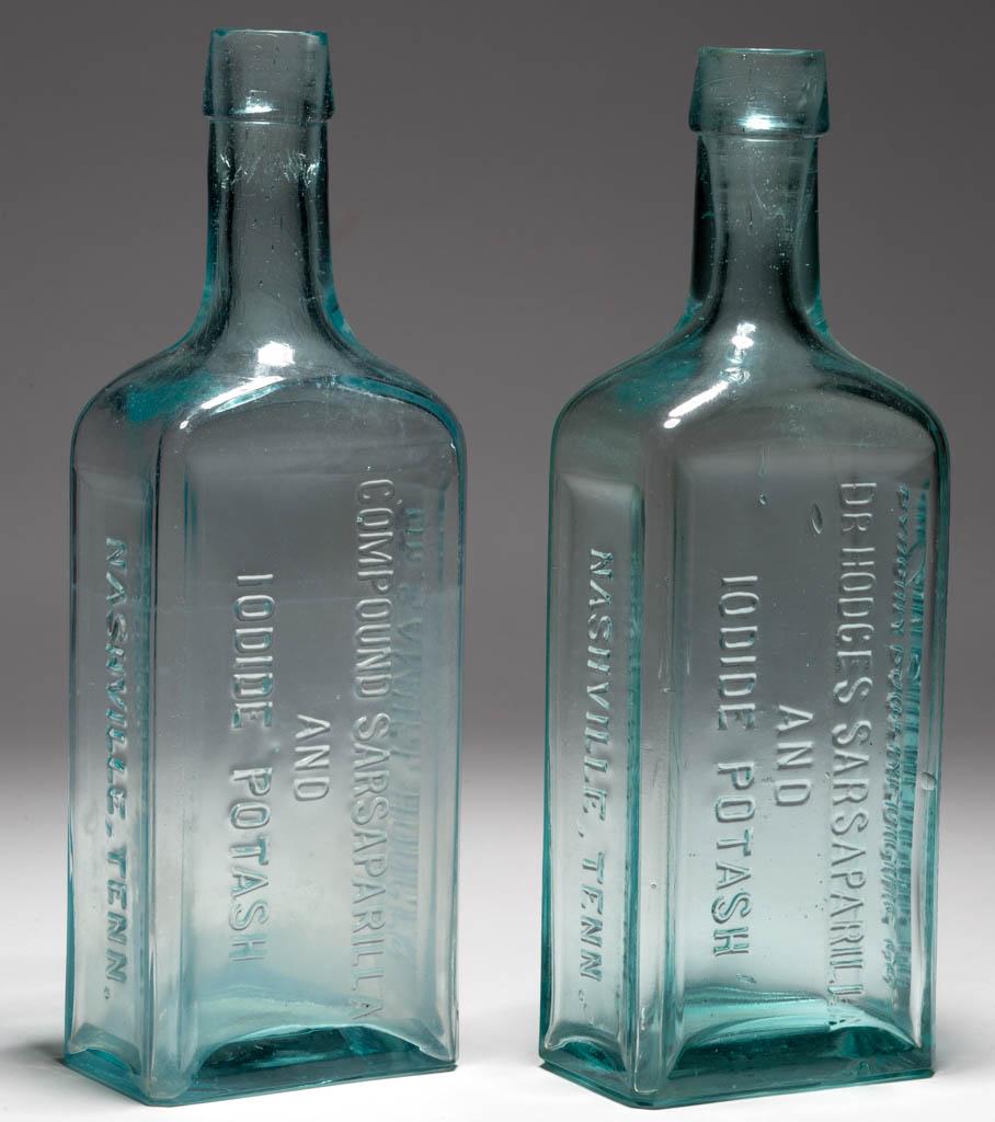 DR. HODGES SARSAPARILLA BOTTLES, LOT OF TWO: DR. HODGES SARSAPARILLA BOTTLES, LOT OF TWO, aquamarine, each rectangular form embossed on three sides, first "RANGUM ROOT MEDICINE CO. - DR HODGES SARSAPARILLA / AND / IODIDE POTASH - NASHVILLE, TENN