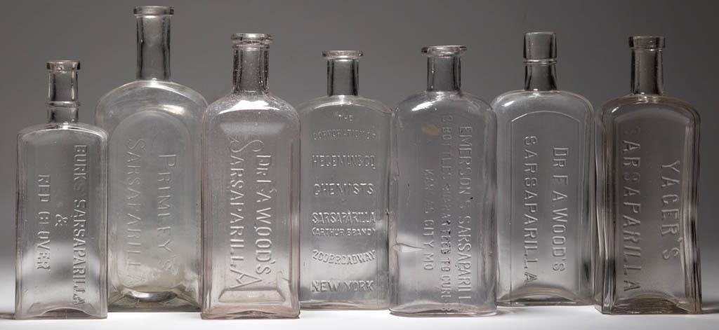 ASSORTED SARSAPARILLA BOTTLES, LOT OF SEVEN: ASSORTED SARSAPARILLA BOTTLES, LOT OF SEVEN, colorless, each rectangular form, embossed for Burk's Sarsaparilla & Red Clover, Hegeman & Co. Chimists Sarsaparilla (Arthur Brand), Yager's. Emerson's, Pr