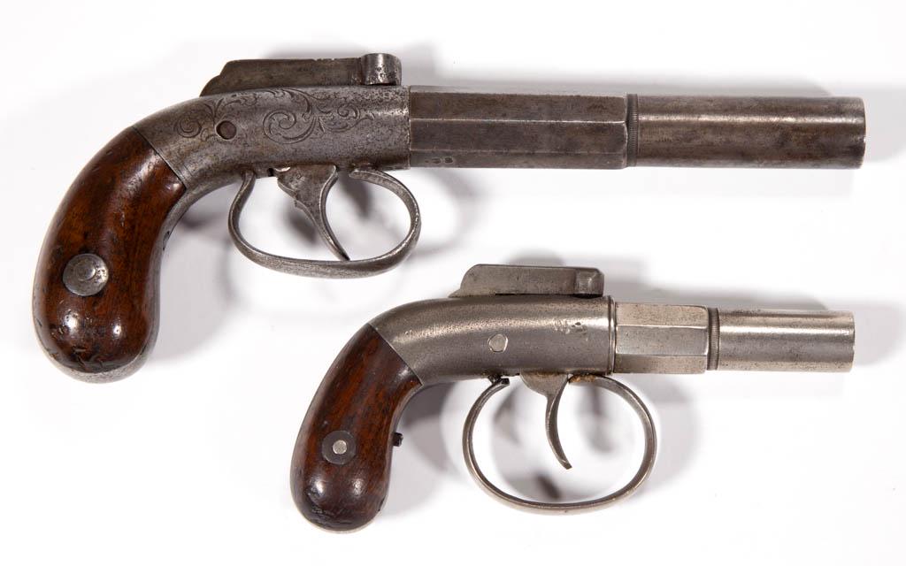 ANTIQUE PERCUSSION BOOT PISTOLS, LOT OF TWO: ANTIQUE PERCUSSION BOOT PISTOLS, LOT OF TWO, each with screw-off octagonal to round barrel, bar hammer, and hardwood grips. Larger example marked "THE WASHINGTON / ARMS Co" and "CAST-STEEL" to barrel 