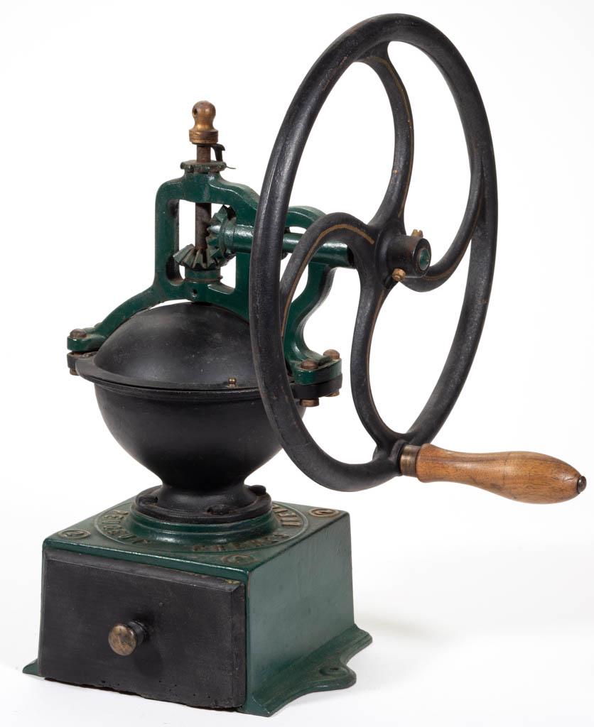 PEUGEOT FRERES MODEL 2 CAST-IRON ONE-WHEEL COFFEE MILL: PEUGEOT FRERES MODEL 2 CAST-IRON ONE-WHEEL COFFEE MILL / GRINDER, swivel lid, original paint. Fourth quarter 19th/early 20th century. 19 1/4" HOA, 13" D wheel. Good overall condition with minor to mod
