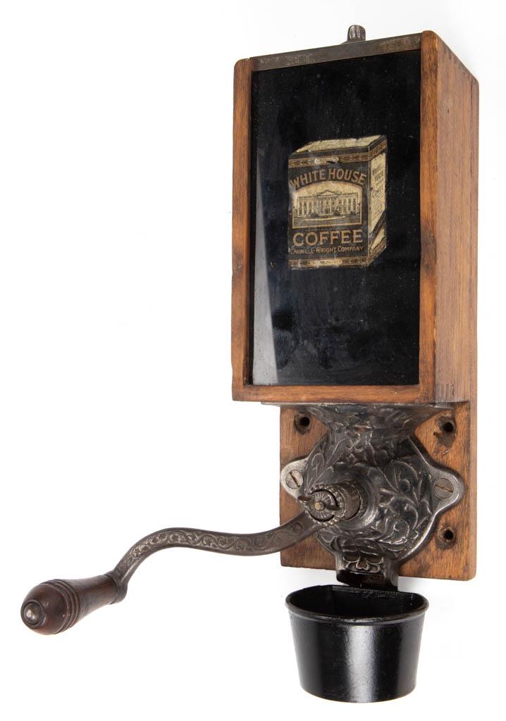 ARCADE X-RAY "WHITE HOUSE COFFEE" CANISTER COFFEE MILL: ARCADE X-RAY "WHITE HOUSE COFFEE" CANISTER COFFEE MILL / GRINDER, rectangular-form wooden hopper with colorless window pane interior painted black and having a paper label for "WHITE HOUSE COFFEE / DW