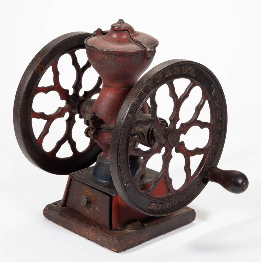 PARKER NO. 200 CAST-IRON TWO-WHEEL COFFEE MILL /: PARKER NO. 200 CAST-IRON TWO-WHEEL COFFEE MILL / GRINDER, swivel lid, original wooden base, paint, and decals. Chas. Parker Co., Meriden, CT. Fourth quarter 19th/early 20th century. 12 1/2" HOA, 9" D 