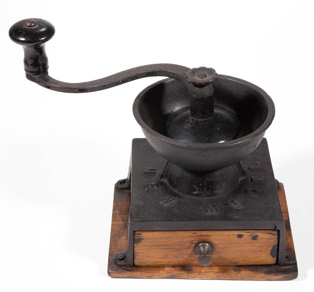NEW UNION "NEW MODEL" CAST-IRON TABLE-TOP BOX COFFEE: NEW UNION "NEW MODEL" CAST-IRON TABLE-TOP BOX COFFEE MILL / GRINDER, cast-iron grinder with attached cover fitted over a wooden base with a sheet-iron and wood catch drawer, cover embossed "NEW MODEL"