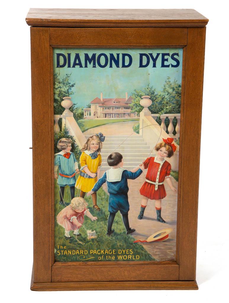 DIAMOND DYES ADVERTISING GENERAL STORE DISPLAY CABINET: DIAMOND DYES ADVERTISING GENERAL STORE DISPLAY CABINET, oak case, front hinged door with lithographed and embossed tin panel insert in the "Jumping Rope" pattern, rear hinged door with instructional t