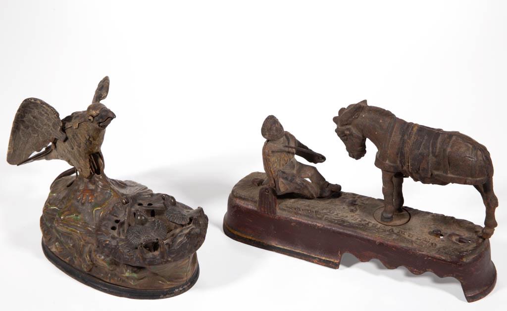 CAST-IRON FIGURAL MECHANICAL BANKS, LOT OF TWO: CAST-IRON FIGURAL MECHANICAL BANKS, LOT OF TWO, comprising an Eagle and Eaglets, designed by Charles M. Henn, marked "PAT JAN 23 1883" to underside of base, and an Always Did Spise' A Mule / Kicking M
