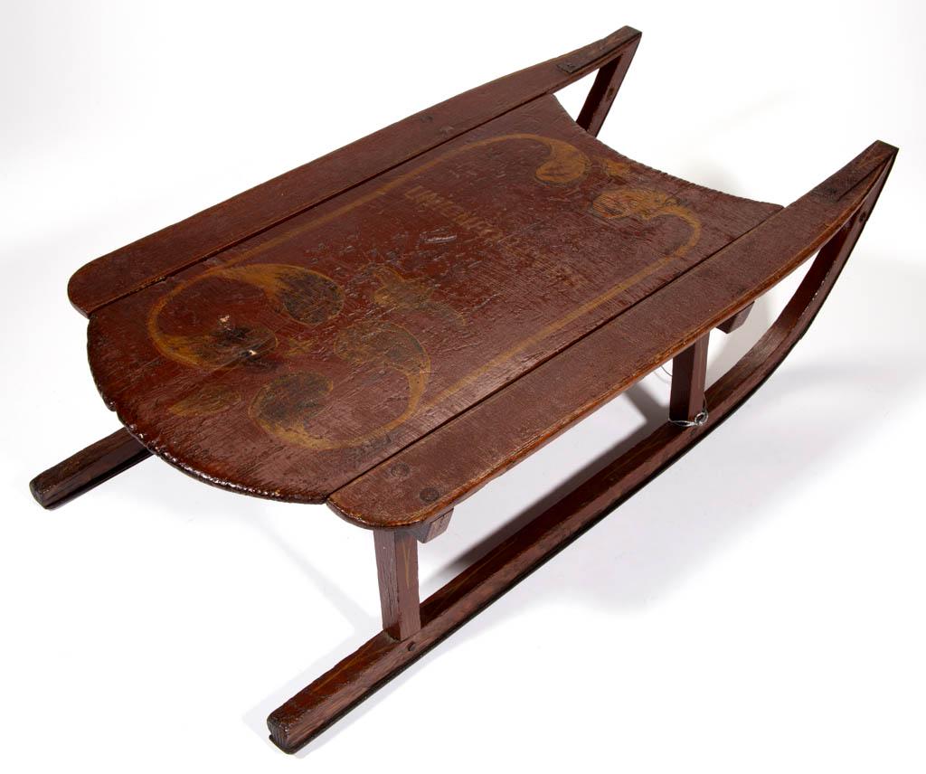 AMERICAN PAINTED-DECORATED PINE CHILD'S SLED: AMERICAN PAINTED-DECORATED PINE CHILD'S SLED, fitted with iron runners, having freehand decoration with "UNION FOREVER" in the center, and "ES" initials on the underside. Retains original paint-decora