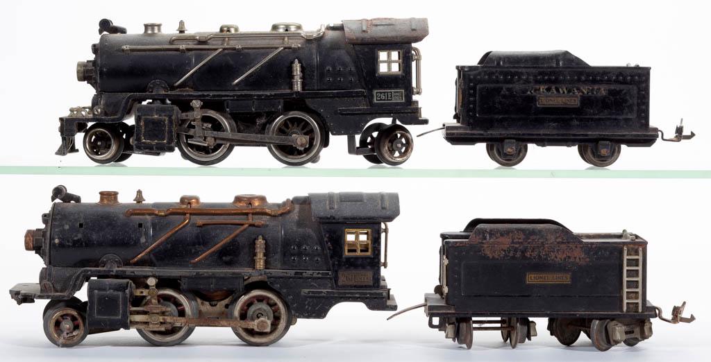 LIONEL NO. 261 / 261E O-GAUGE LOCOMOTIVES WITH TENDERS,: LIONEL NO. 261 / 261E O-GAUGE LOCOMOTIVES WITH TENDERS, LOT OF TWO, including one tender marked "LACKAWANNA". Circa 1929. No. 261 locomotive 9 3/4" LOA.Fair overall condition, each lacking wheels, min
