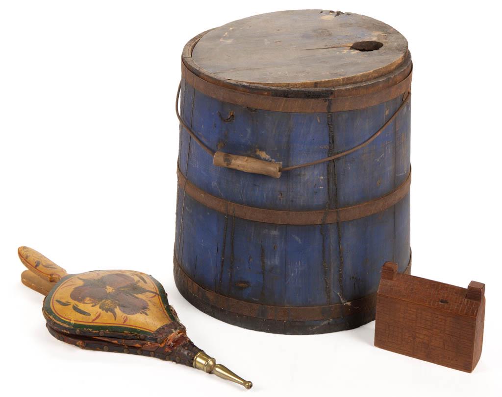 AMERICAN PAINTED TREEN TAR BUCKET WITH COVER: AMERICAN PAINTED TREEN TAR BUCKET WITH COVER, staves secured with three metal bands having bail handle. Retains an old blue-painted surface. Together with a paint-decorated bellows, and a folk art car