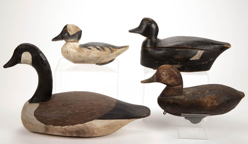 FOLK ART CARVED AND PAINTED GOOSE / DUCK DECOYS, LOT OF: FOLK ART CARVED AND PAINTED GOOSE / DUCK DECOYS, LOT OF FOUR, including Canadian goose and bufflehead examples, each with likely original weights. Old working surfaces. 20th century. Goose 13 1/2" HOA