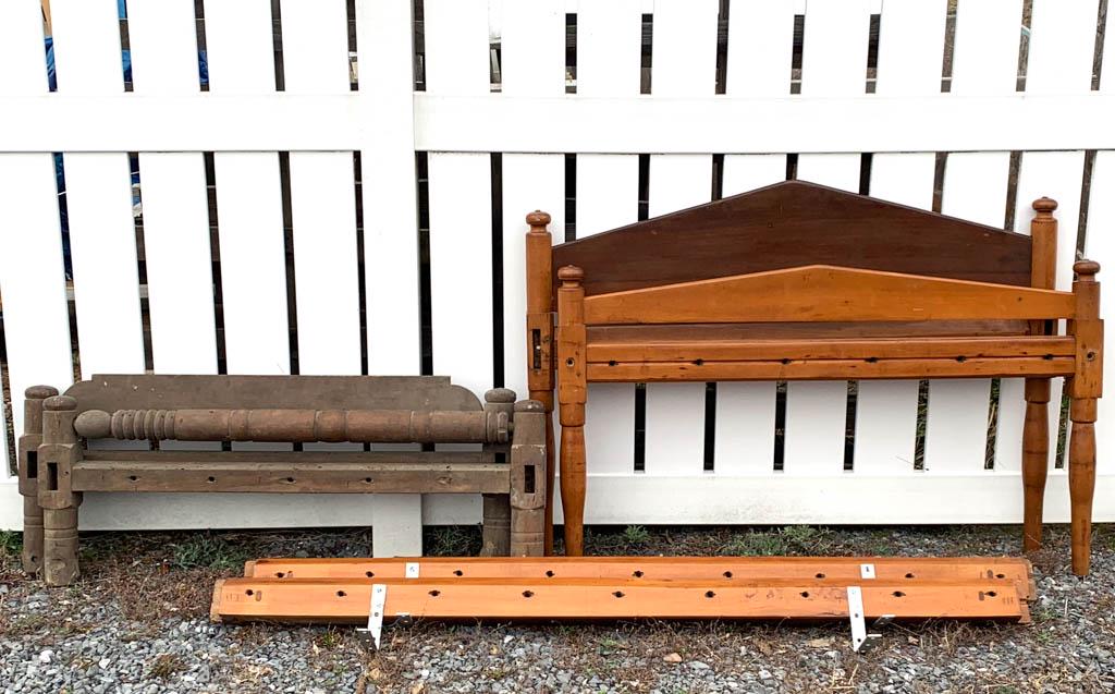SHENANDOAH VALLEY OF VIRGINIA MIXED-WOOD TRUNDLE ROPE: SHENANDOAH VALLEY OF VIRGINIA MIXED-WOOD TRUNDLE ROPE BED, with turnings to the bed's posts. Early dry surface. Together with a youth bed, and paint-decorated rush-seat side chair (not photographed). 