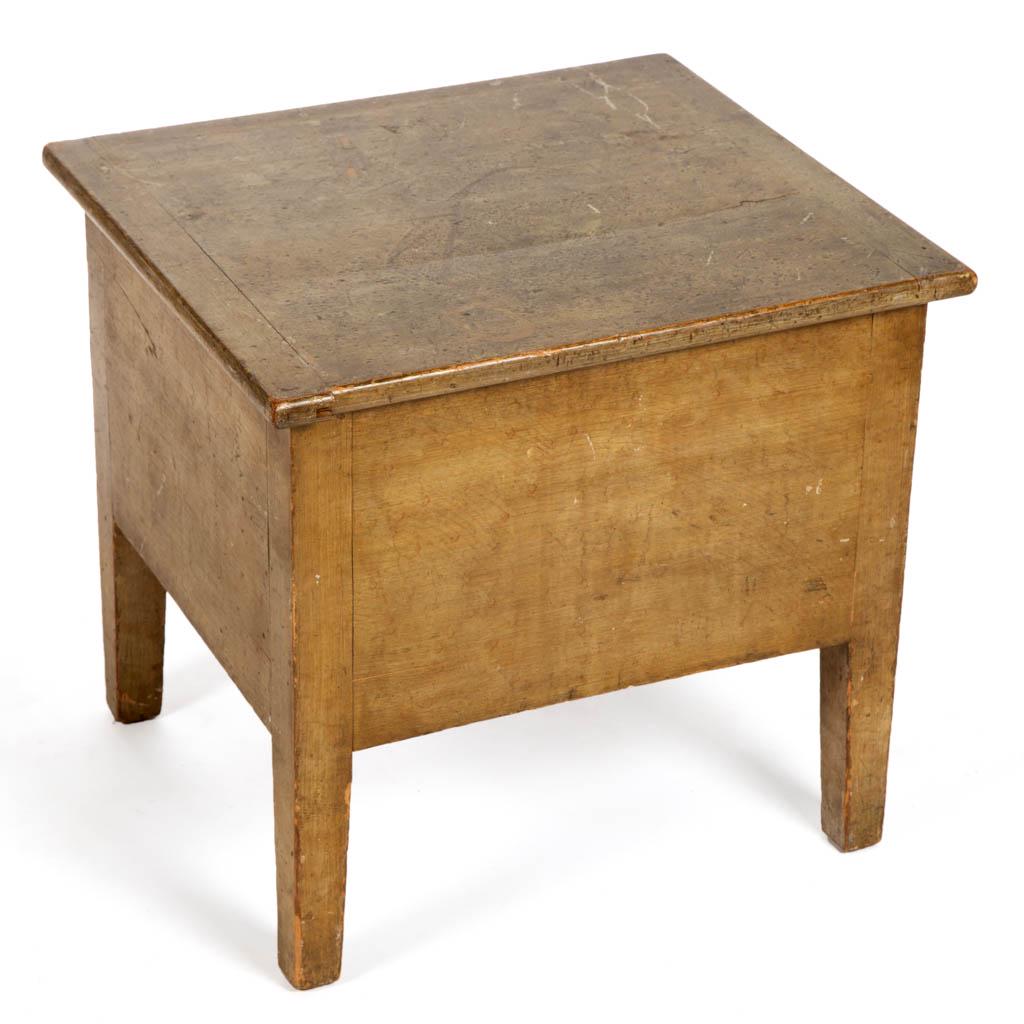 AMERICAN COUNTRY PAINTED-DECORATED PINE COMMODE: AMERICAN COUNTRY PAINTED-DECORATED PINE COMMODE, with hinged lid, raised on simple square legs. Retains likely original paint-decorated surface. First half 19th century. 19" H, 20 3/4" W, 18 1/2" D. V