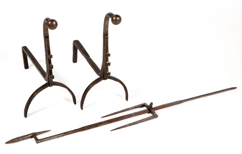 AMERICAN WROUGHT-IRON HEARTH SPIT HOLDER WITH ANDIRONS,: AMERICAN WROUGHT-IRON HEARTH SPIT HOLDER WITH ANDIRONS, SET OF THREE PIECES, comprising a spit holder with simple blade-form shaft terminating in a spear having adjustable sliding double blade skewer 