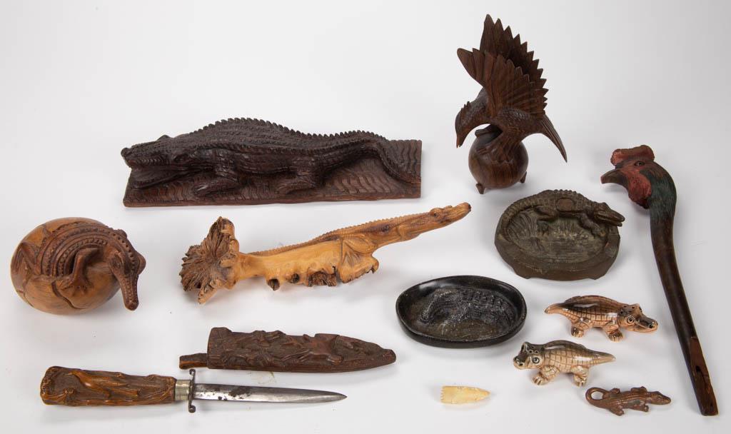 ASSORTED FOLK ART CARVED ARTICLES, LOT OF EIGHT: ASSORTED FOLK ART CARVED ARTICLES, LOT OF EIGHT, including a partial cane with the carved head of a rooster, a carved knife with sheath depicting figures of deer and birds, and an alligator carving. T