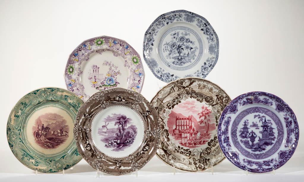ENGLISH STAFFORDSHIRE TRANSFER-PRINTED CERAMIC PLATES,: ENGLISH STAFFORDSHIRE TRANSFER-PRINTED CERAMIC PLATES, LOT OF SIX, including one having central mulberry/purple transfer pattern "PERUVIAN / HORSE / HUNT" with green border design, one featuring centr