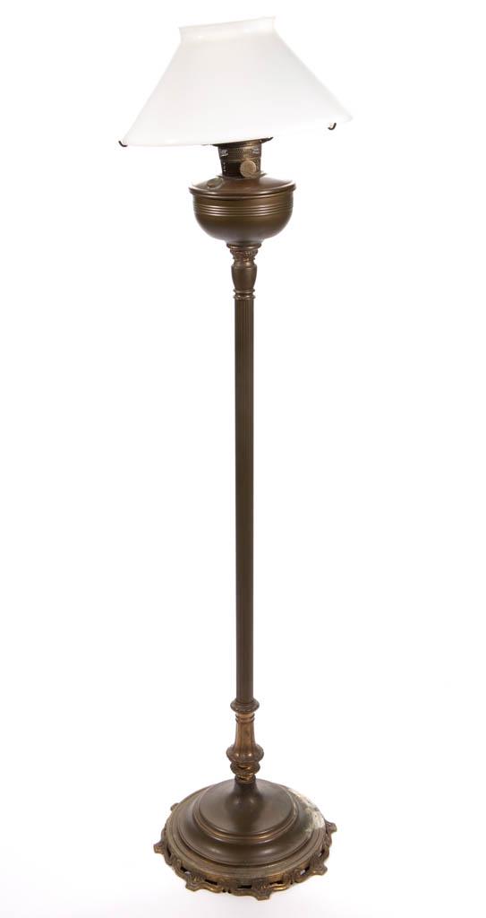 ALADDIN MODEL B-426 KEROSENE FLOOR LAMP: ALADDIN MODEL B-426 KEROSENE FLOOR LAMP, Oxidized Bronze, domed font bowl raised on a Classical top connector, central ribbed pole leading to a complex looped and panelled lower connector, stepped cir