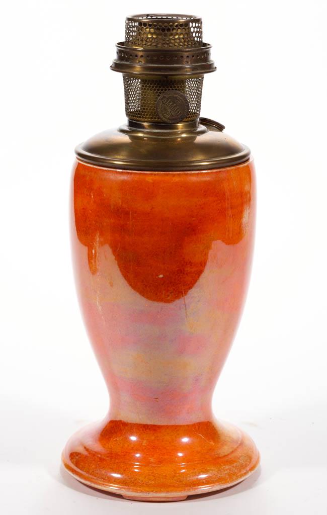 ALADDIN MOTTLED CROWN DEVON CERAMIC KEROSENE SHORT VASE: ALADDIN MOTTLED CROWN DEVON CERAMIC KEROSENE SHORT VASE LAMP, Orange Lustre, signed to the underside "CROWN/DEVON/FIELDINGS/MADE IN ENGLAND". Fitted with a brass drop-in font and a brass Model 12 burn