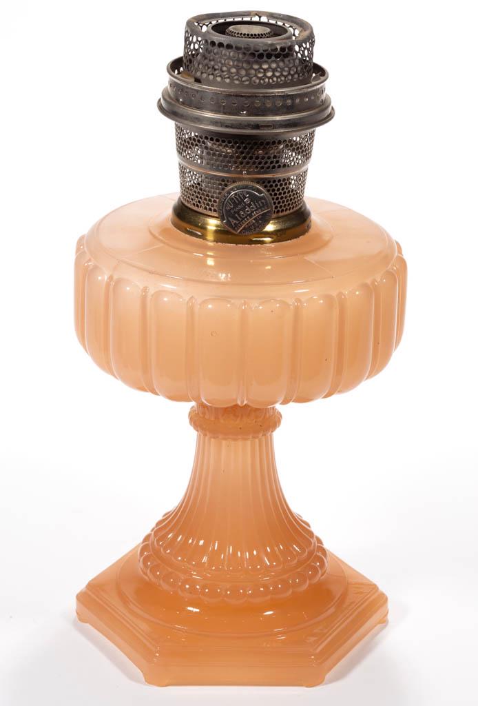 ALADDIN MODEL 112 / CATHEDRAL KEROSENE STAND LAMP: ALADDIN MODEL 112 / CATHEDRAL KEROSENE STAND LAMP, Pastel Flesh Moonstone, crimped collar, side refill feature with period screw-cap. Fitted with a nickel Model B "CHICAGO" burner having a flame sprea