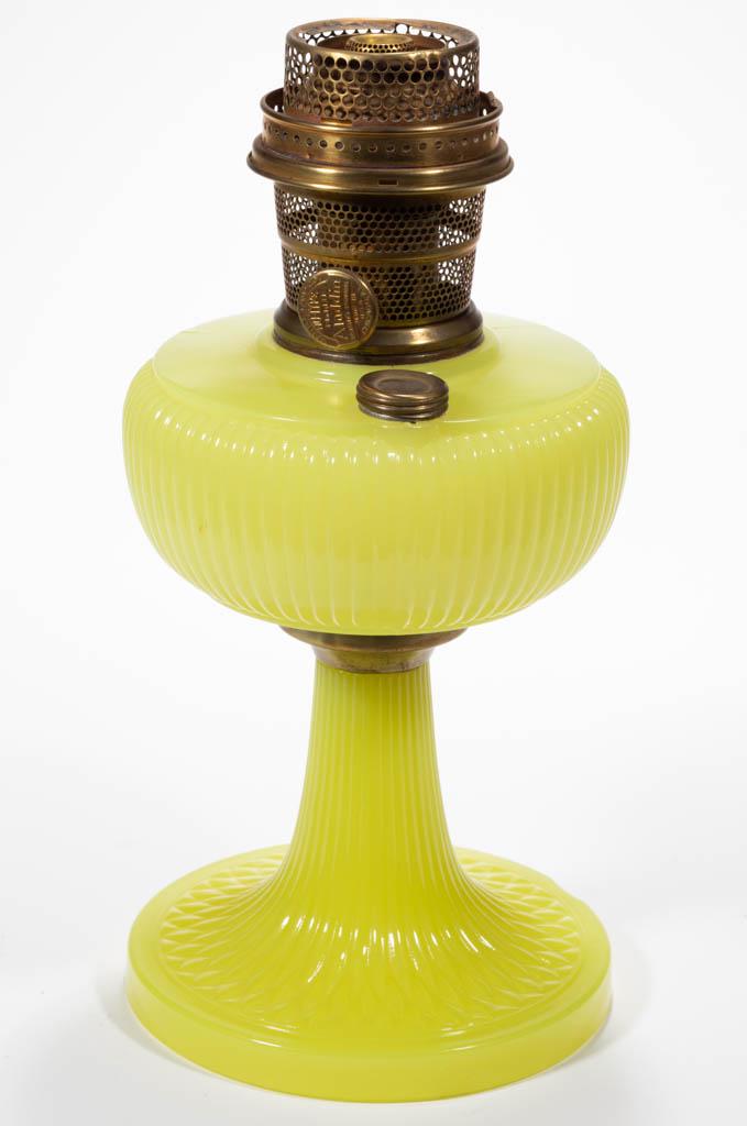 ALADDIN MODEL B-88 / VERTIQUE KEROSENE STAND LAMP: ALADDIN MODEL B-88 / VERTIQUE KEROSENE STAND LAMP, Yellow Moonstone, plain brass connector, radial groove collar, side refill feature with original cap. Fitted with a brass Model B "CHICAGO" burner ha