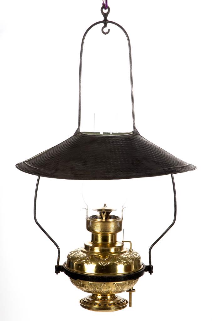 BRISTOL GENUINE MAMMOTH KEROSENE HANGING LAMP: BRISTOL GENUINE MAMMOTH KEROSENE HANGING LAMP, large embossed brass font with side refill feature and wick riser, into a harp hanging rig. Fitted with original burner having correct flame spreader, co