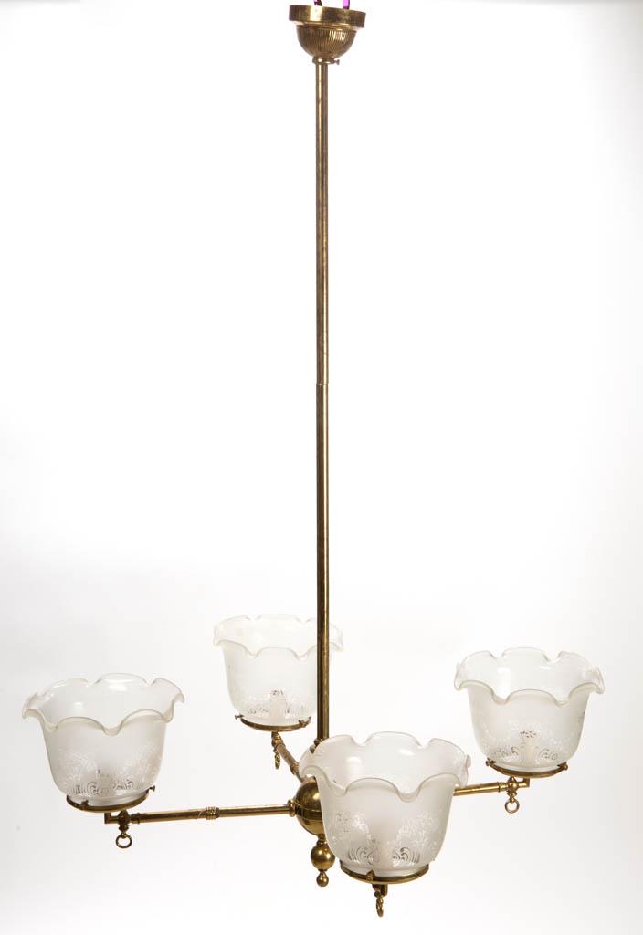 BRASS FOUR-SOCKET GAS CHANDELIER: BRASS FOUR-SOCKET GAS CHANDELIER, frosted colorless acid-etched gas shades, central pole leading to a small globular central hub with four horizontal supporting arms leading to a single socket. Maker 