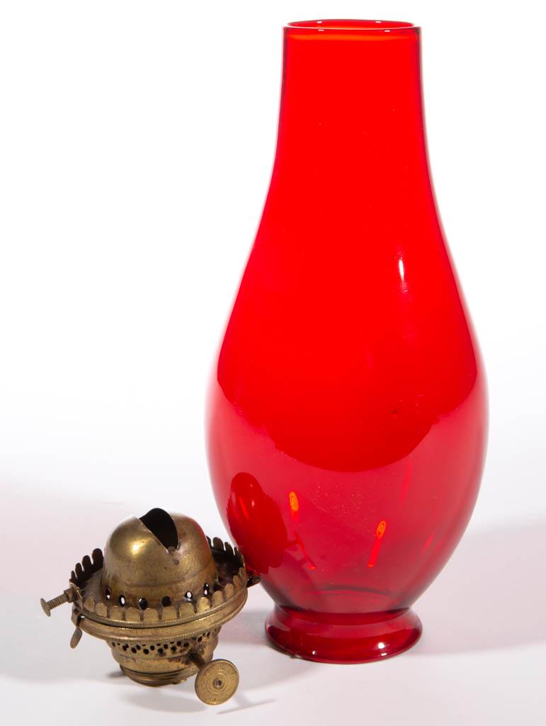 EARLY RUBY GLASS NO. 2 LIP CHIMNEY: EARLY RUBY GLASS NO. 2 LIP CHIMNEY, ovoid form. Fitted with a No. 2 "E. MILLER" lip burner. Second half 19th century. 8 1/8" H, 2 1/8" D fitter. Undamaged. Provenance: From the Fil (John) and Robbie G