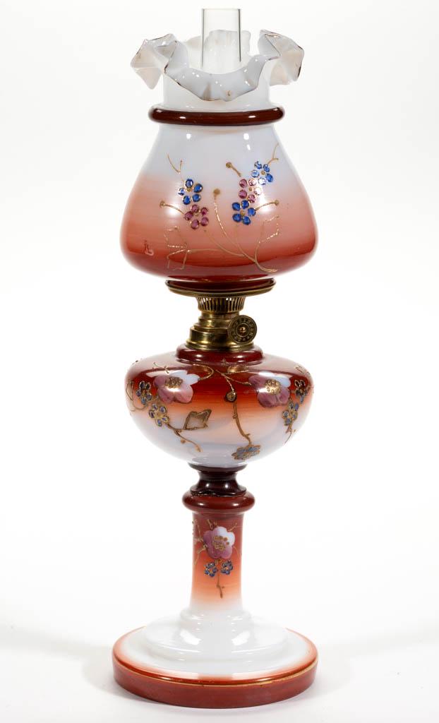 VICTORIAN DECORATED OPAQUE GLASS MINIATURE STAND LAMP: VICTORIAN DECORATED OPAQUE GLASS MINIATURE STAND LAMP, opalescent with chestnut brown shading, raised berry and floral polychrome and gilt decoration, pyriform font raised on a stem with ringed knop a