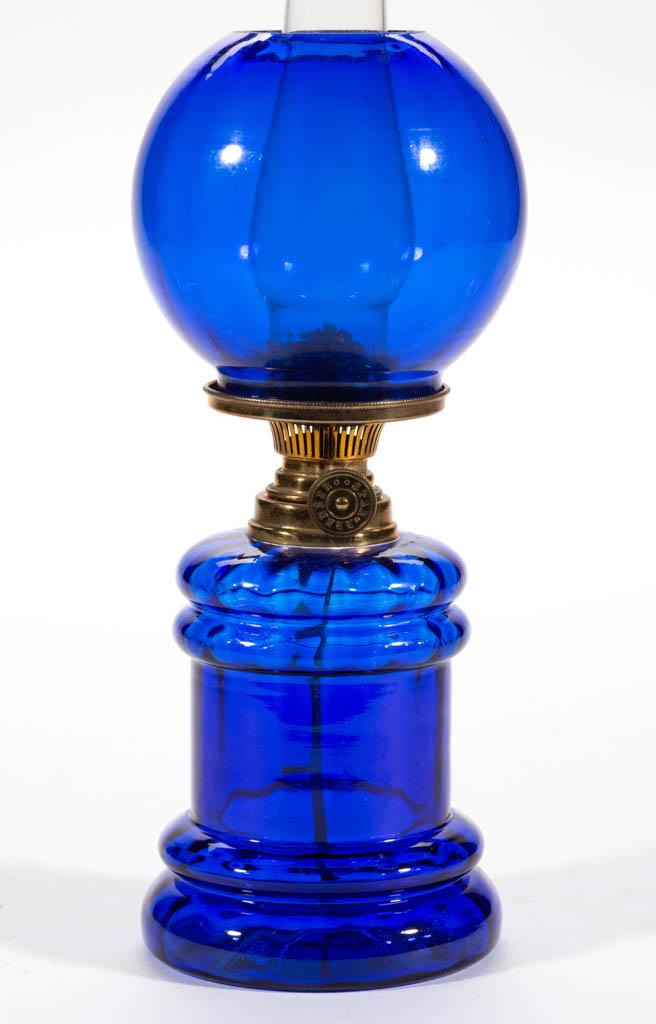 PANEL-OPTIC MINIATURE LAMP: PANEL-OPTIC MINIATURE LAMP, sapphire blue, cylinder-form font with wide concave medial band, slightly lighter blue and bubbly matching patterned ball-form shade, period collar. Fitted with a Spar Bren