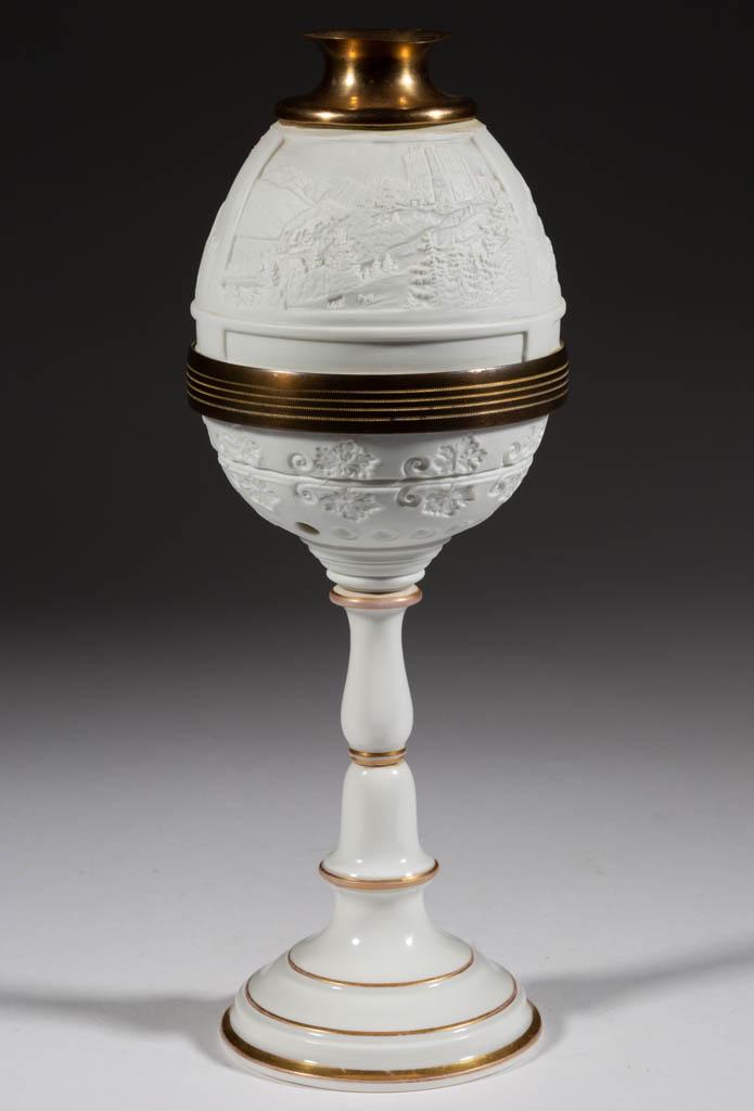 GERMAN KPM PORCELAIN LITHOPHANE SHADE FAIRY LAMP: GERMAN KPM PORCELAIN LITHOPHANE SHADE FAIRY LAMP, umbrella-form shade with three landscape panels featuring structures, brass top and bottom mounts, fitted on original bolted base, the cup having foli