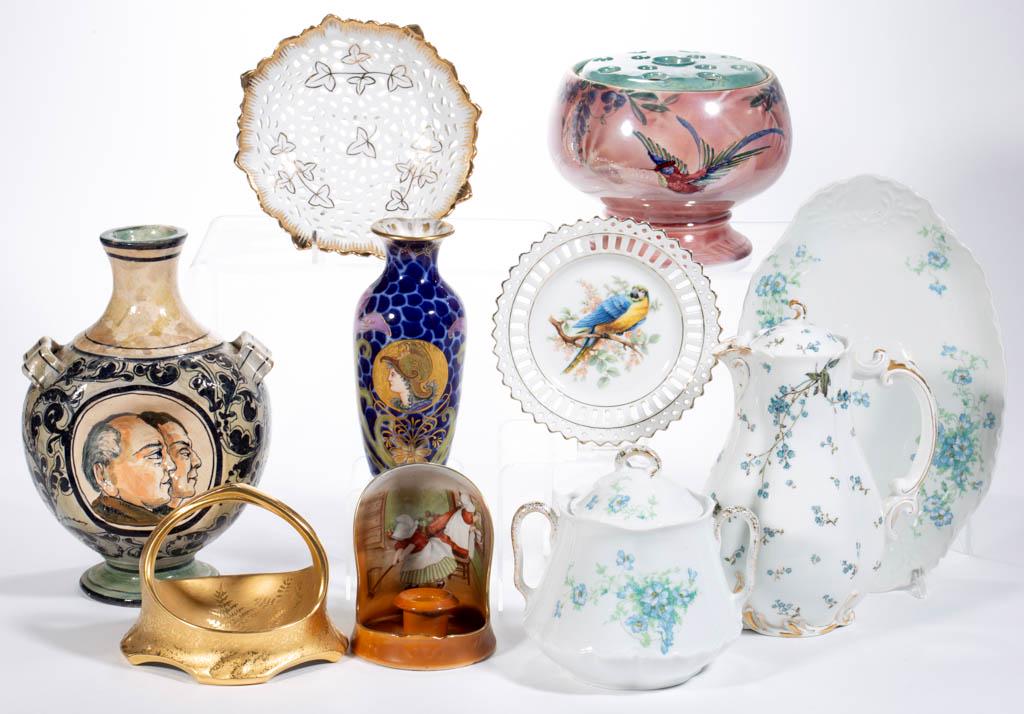 ASSORTED CONTINENTAL CERAMIC ARTICLES, LOT OF TEN: ASSORTED CONTINENTAL CERAMIC ARTICLES, LOT OF TEN, including a Sunbonnet Babies candlestick holder featuring two bonneted children cleaning, a Burleigh Ware vase with flower frog insert having polychr