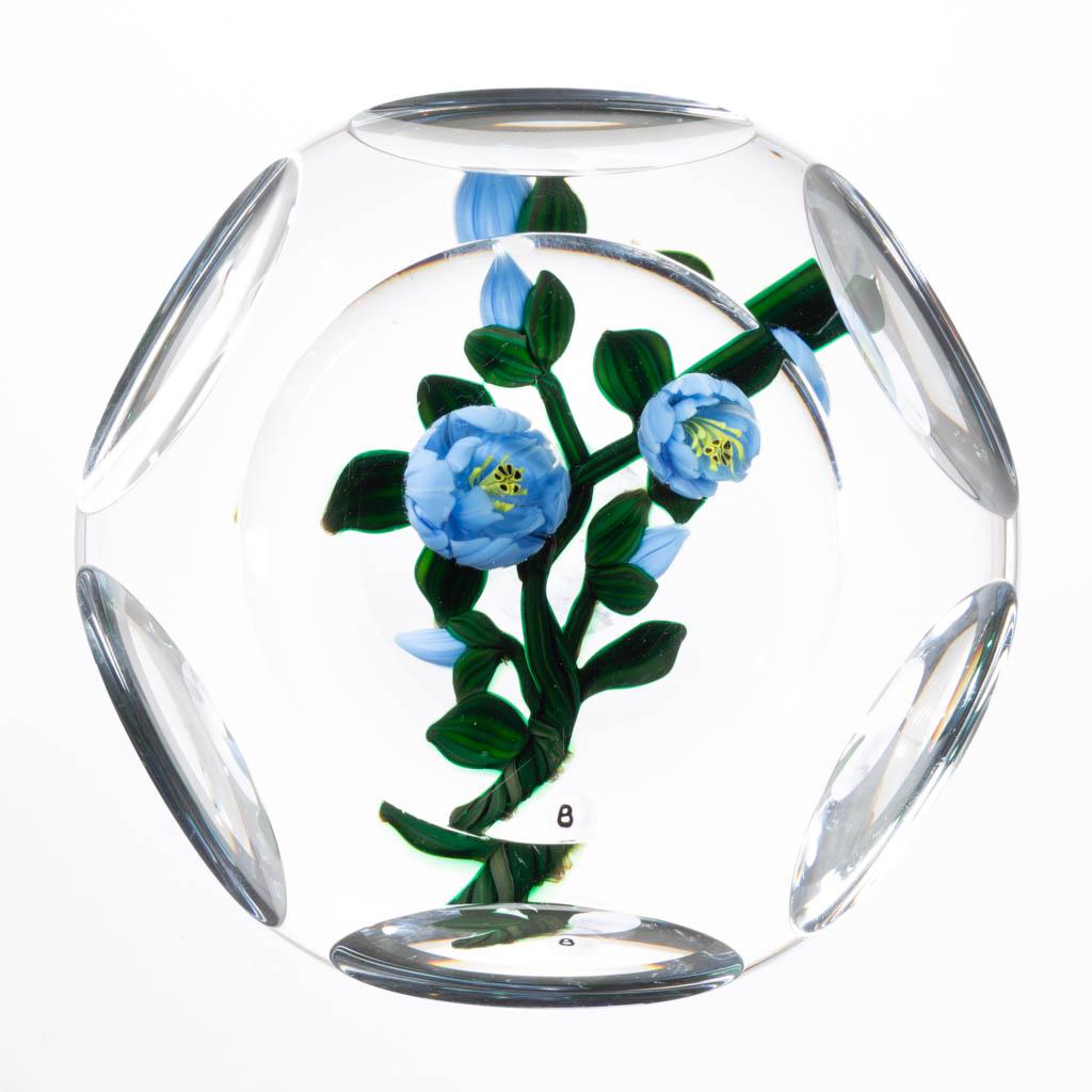 RAY BANFORD FLORAL LAMPWORK STUDIO ART GLASS: RAY BANFORD FLORAL LAMPWORK STUDIO ART GLASS PAPERWEIGHT, colorless, cut-faceted, central twisting stem supporting two blooms, three buds, and seven leaves, B-signature cane at the base of the stem, p