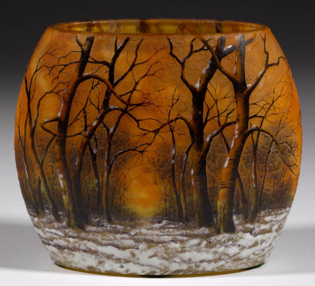 DAUM NANCY WINTER CAMEO PILLOW VASE: DAUM NANCY WINTER CAMEO PILLOW VASE, mottled amber ground with brown and white enamel decoration, oval form, factory-polished rim, polished base, signed "Daum/Nancy" with the cross of Lorraine. France