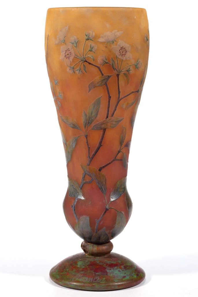 DAUM CAMEO ART GLASS VASE: DAUM CAMEO ART GLASS VASE, orange and cranberry mottled ground, large bud form with blooming branches of flowers with polychrome-enamel to the surface, polychrome mottled foot signed "France" to the e