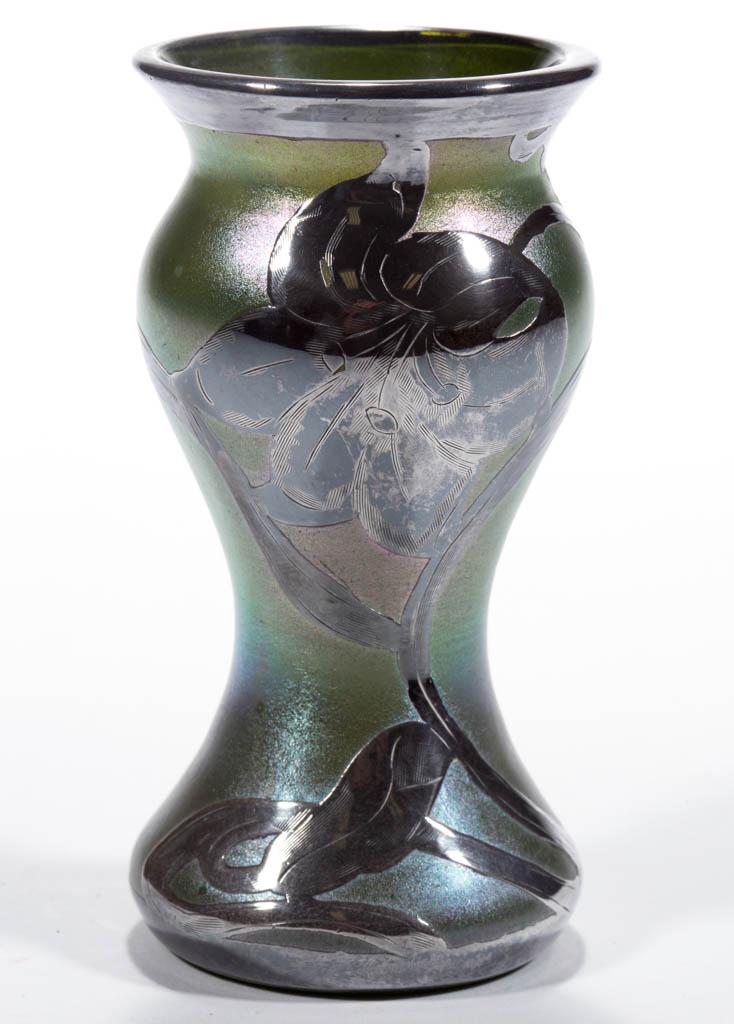LOETZ ATTRIBUTED IRIDESCENT ART GLASS - SILVER-OVERLAY: LOETZ ATTRIBUTED IRIDESCENT ART GLASS - SILVER-OVERLAY CABINET VASE, green iridescent, waisted form with floral overlay decoration. Bohemia, now Czech Republic. First quarter 20th century. 4 1/4" H. U