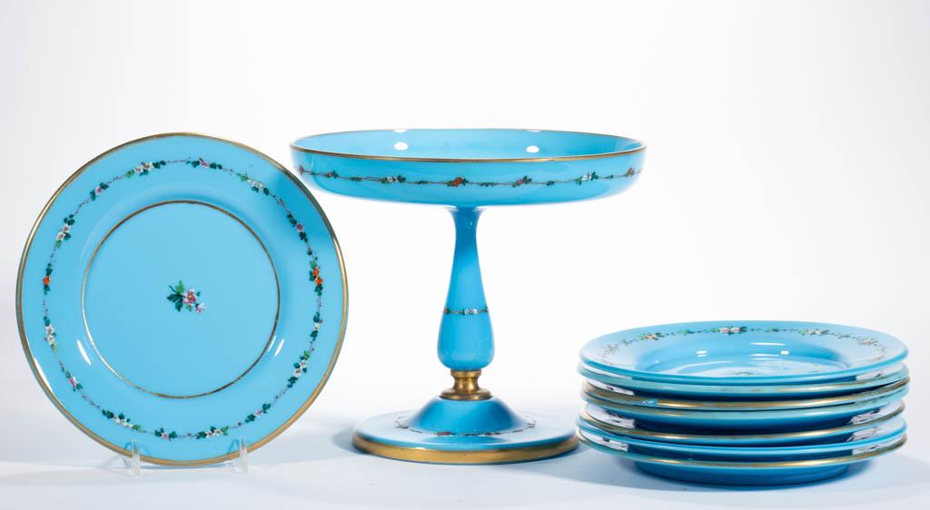 CONTINENTAL OPALINE AND ENAMEL-DECORATED ARTICLES, LOT: CONTINENTAL OPALINE AND ENAMEL-DECORATED ARTICLES, LOT OF NINE, blue opaline with polychrome-enamel and gilt decoration, comprising a compote and eight plates, each with matching or near-matching flor