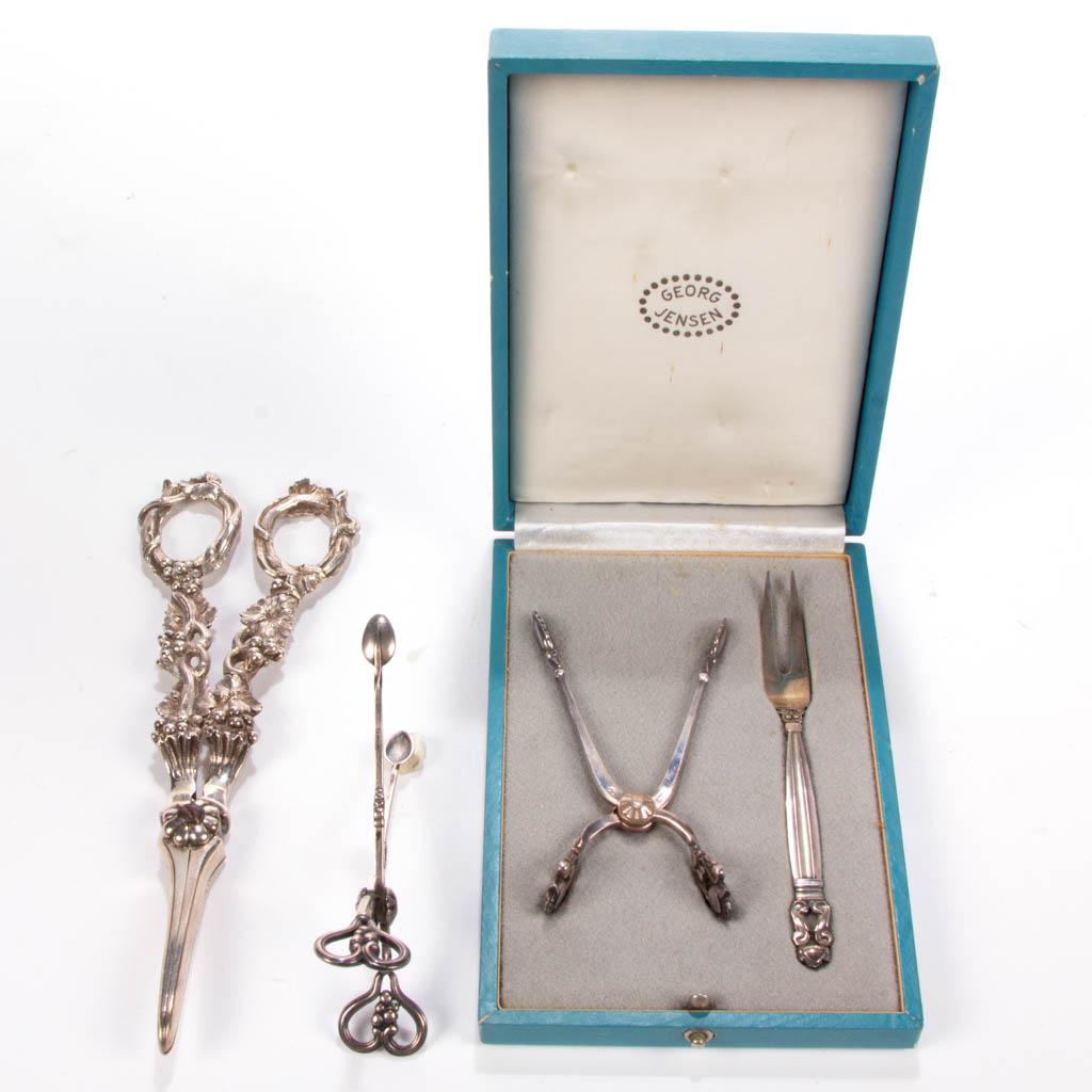 ENGLISH AND GEORG JENSEN DANISH STERLING SILVER SERVING: ENGLISH AND GEORG JENSEN DANISH STERLING SILVER SERVING UTENSILS, LOT OF FOUR, comprising a pair of grape shears by London maker Charles Reily & George Storer with 1848 date mark and a Queen Victoria