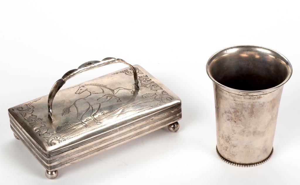 DUTCH 0.833 SILVER ARTICLES, LOT OF TWO: DUTCH 0.833 SILVER ARTICLES, LOT OF TWO, comprising a rectangular box featuring engraved design with horse to top of the lid and a hinged handle, raised on four spherical feet, and a short beaker by J