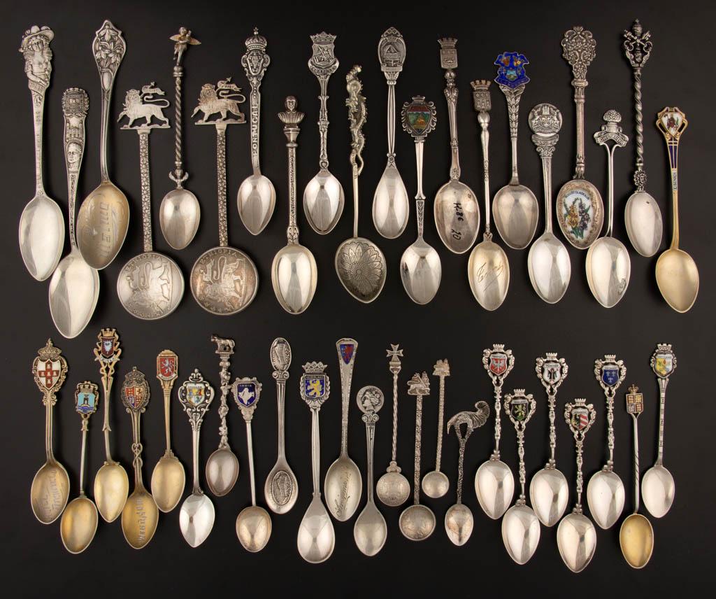 INTERNATIONAL STERLING, .800 SILVER, AND OTHER SOUVENIR: INTERNATIONAL STERLING, .800 SILVER, AND OTHER SOUVENIR SPOONS, LOT OF 43, including several German, four Ethiopia, two Japan for Nagasaki and Kyoto, a Portugal, and several English examples. Most wit