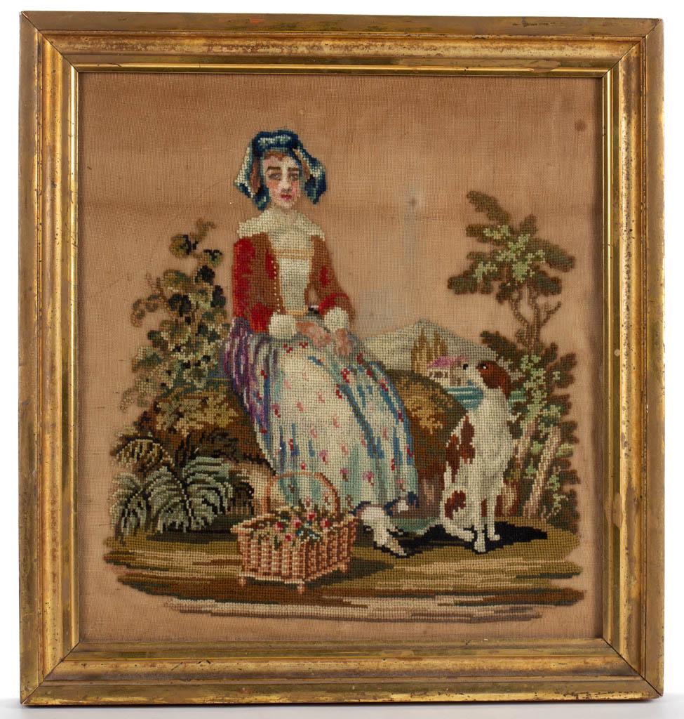 PICTORIAL BERLINWORK NEEDLEWORK: PICTORIAL BERLINWORK NEEDLEWORK, wool on linen, depicting a young lady with gathering basket and her dog, no signature. Housed under glass in period gilt frame. 19th century. 14 1/2" x 13 1/2" sight, 
