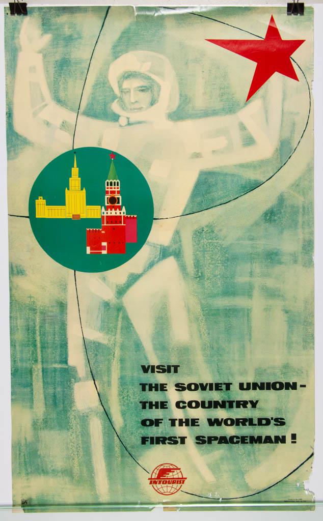 RUSSIAN / SOVIET UNION INTOURIST TRAVEL POSTER: RUSSIAN / SOVIET UNION INTOURIST TRAVEL POSTER, titled "VISIT THE SOVIET UNION-THE COUNTRY OF THE WORLD'S FIRST SPACEMAN!", featuring cosmonaut Yuri Gagarin (1934-1968). Circa 1963. 38 1/2" x 23 1/2".