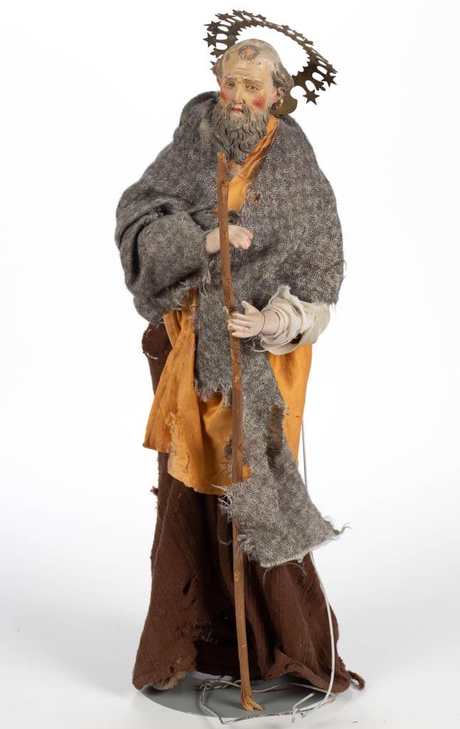 CONTINENTAL PAINTED SANTOS FIGURE: CONTINENTAL PAINTED SANTOS FIGURE, stuffed body, earthenware face and feet, later porcelain hands, possibly depicting Saint Peter, in later clothing, and wooden walking staff. Pieces possibly together