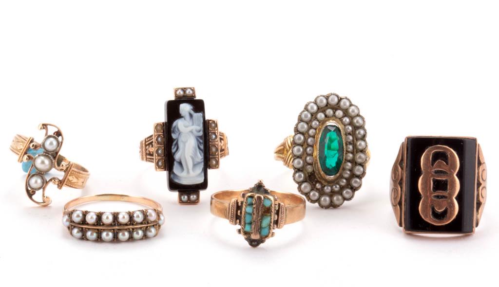 ANTIQUE / VINTAGE GOLD AND OTHER RINGS, LOT OF SIX: ANTIQUE / VINTAGE GOLD AND OTHER RINGS, LOT OF SIX, comprising a marked 10K ring featuring a green glass surrounded by seed pearl-type beads, three unmarked examples that tested as 10K gold with seed 