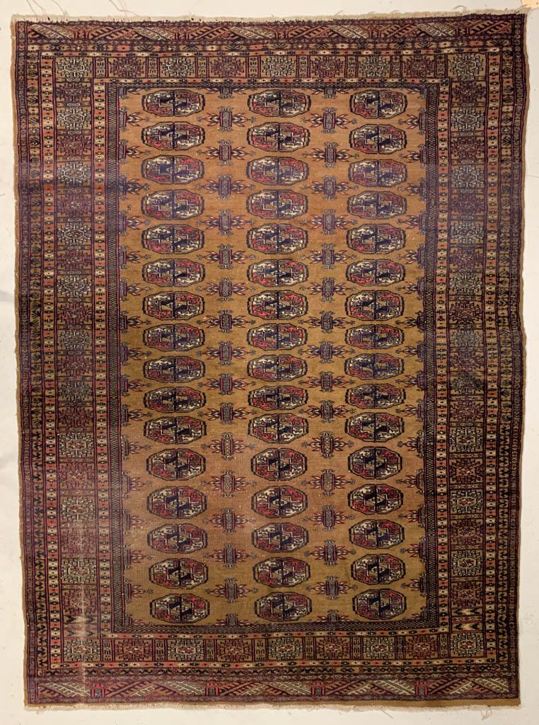 SEMI-ANTIQUE BOKHARA SCATTER ORIENTAL RUG: SEMI-ANTIQUE BOKHARA SCATTER ORIENTAL RUG, cream and red ground, three columns of 15 guls. First half 20th century. 5' 6" x 4'. Very good overall condition, minor losses to trim, and moderate areas of
