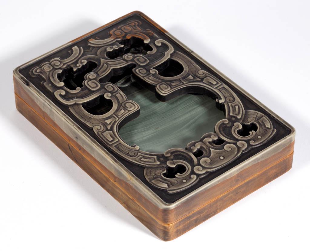 CHINESE QING-STYLE INKSTONE WITH CASE: CHINESE QING-STYLE INKSTONE WITH CASE, possibly Duan, having rectangular form with carved ivy-like design surrounding well at top with shallow circular indentation below, having nine inscribed charact