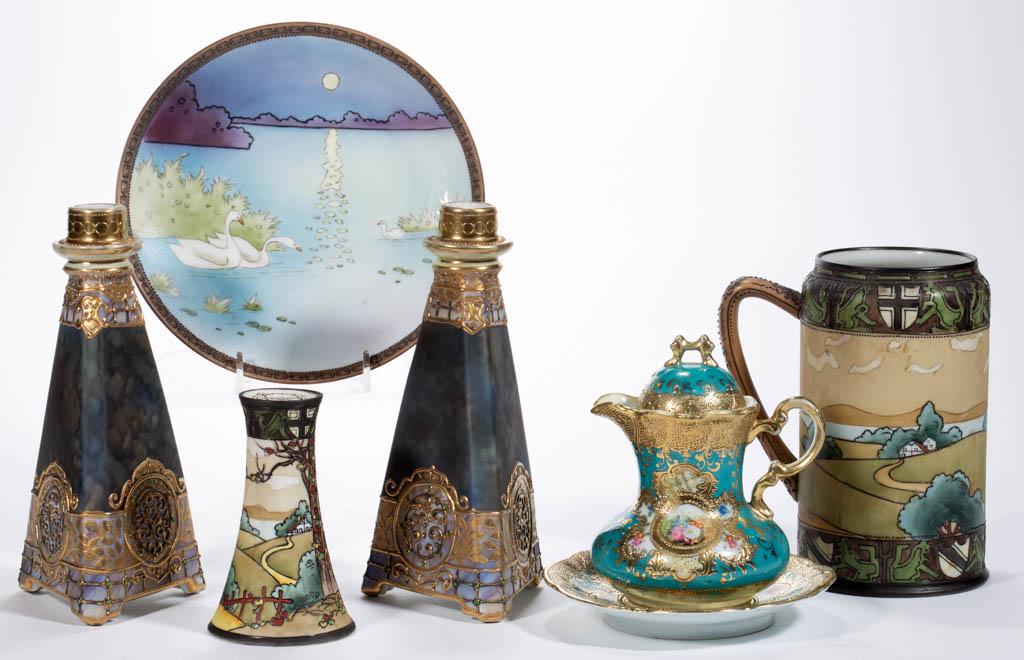 JAPANESE NIPPON PORCELAIN ARTICLES, LOT OF SEVEN: JAPANESE NIPPON PORCELAIN ARTICLES, LOT OF SEVEN, each having hand-painted polychrome designs, including a hat pin holder and tankard each featuring an autumnal landscape scene with two trees in foreg