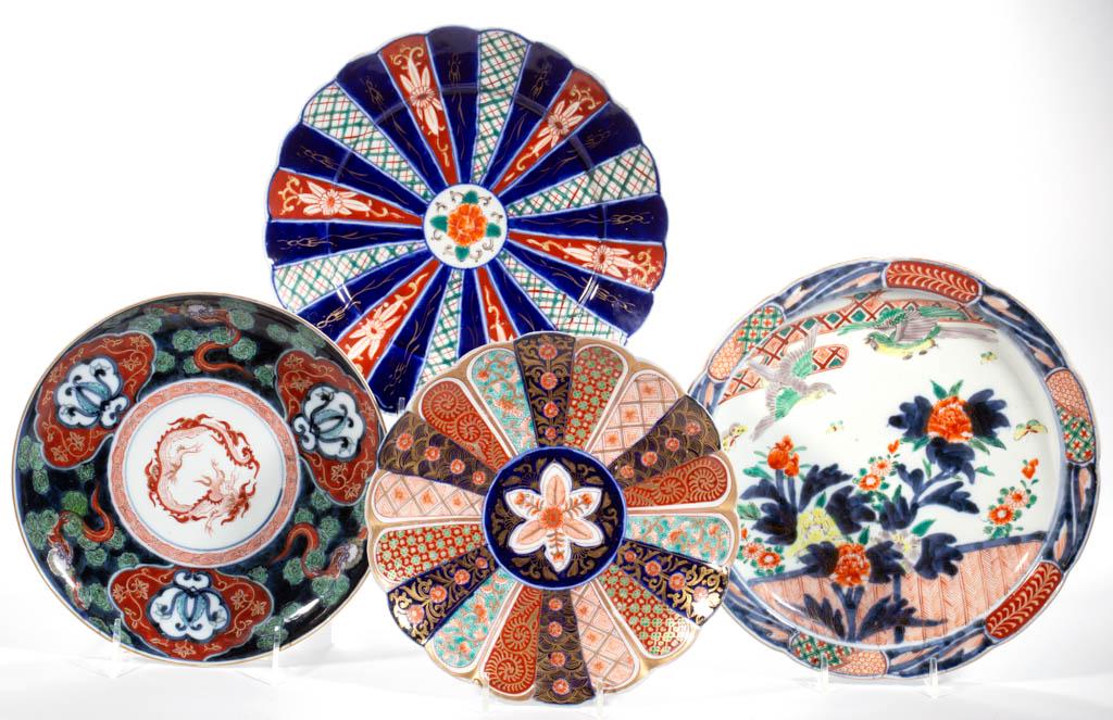 JAPANESE MEIJI / TAISHO-PERIOD IMARI PORCELAIN PLATES,: JAPANESE MEIJI / TAISHO-PERIOD IMARI PORCELAIN PLATES, LOT OF FOUR, each having underglaze blue with polychrome overglaze decorations and gilt highlights, comprising one having two colorful soaring bi
