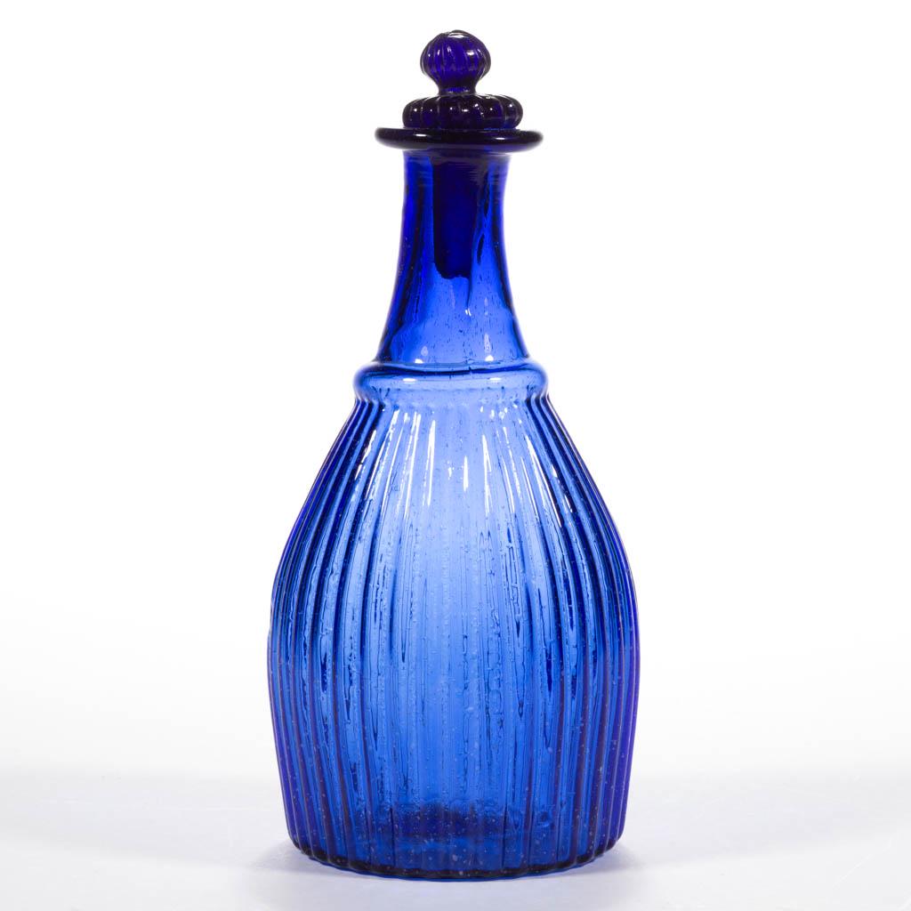 BLOWN-MOLDED GI-7 TYPE II CRUET / TOILET BOTTLE: BLOWN-MOLDED GI-7 TYPE II CRUET / TOILET BOTTLE, medium blue, folded rim, plain base with rough pontil mark, having a solid pressed and ribbed Tam-O'-Shanter stopper. Probably Boston & Sandwich Glass 