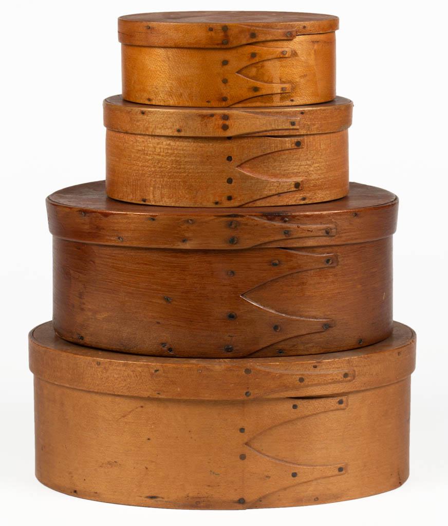 SET OF FOUR GRADUATED SHAKER BENTWOOD BOXES: SET OF FOUR GRADUATED SHAKER BENTWOOD BOXES, each of maple / birch and pine oval form with copper tack and wooden pin construction, largest branded to underside of base "N. MOODY" with some later penc